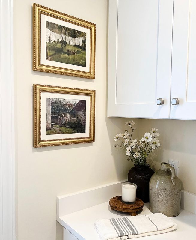 gold picture frames in a kitchen